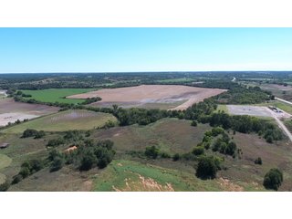 NORTH VIEW - SIGNIFICANT LAND & PRODUCING MINERALS AUCTION - 237 +/- SURFACE ACRES IN 4 TRACTS - 18 MINERAL PACKAGES IN GARVIN, MCCLAIN, GRADY & ROGER MILLS COUNTIES, OK - 6 Mo. AVG. CASH FLOW of $196,376/Mo.